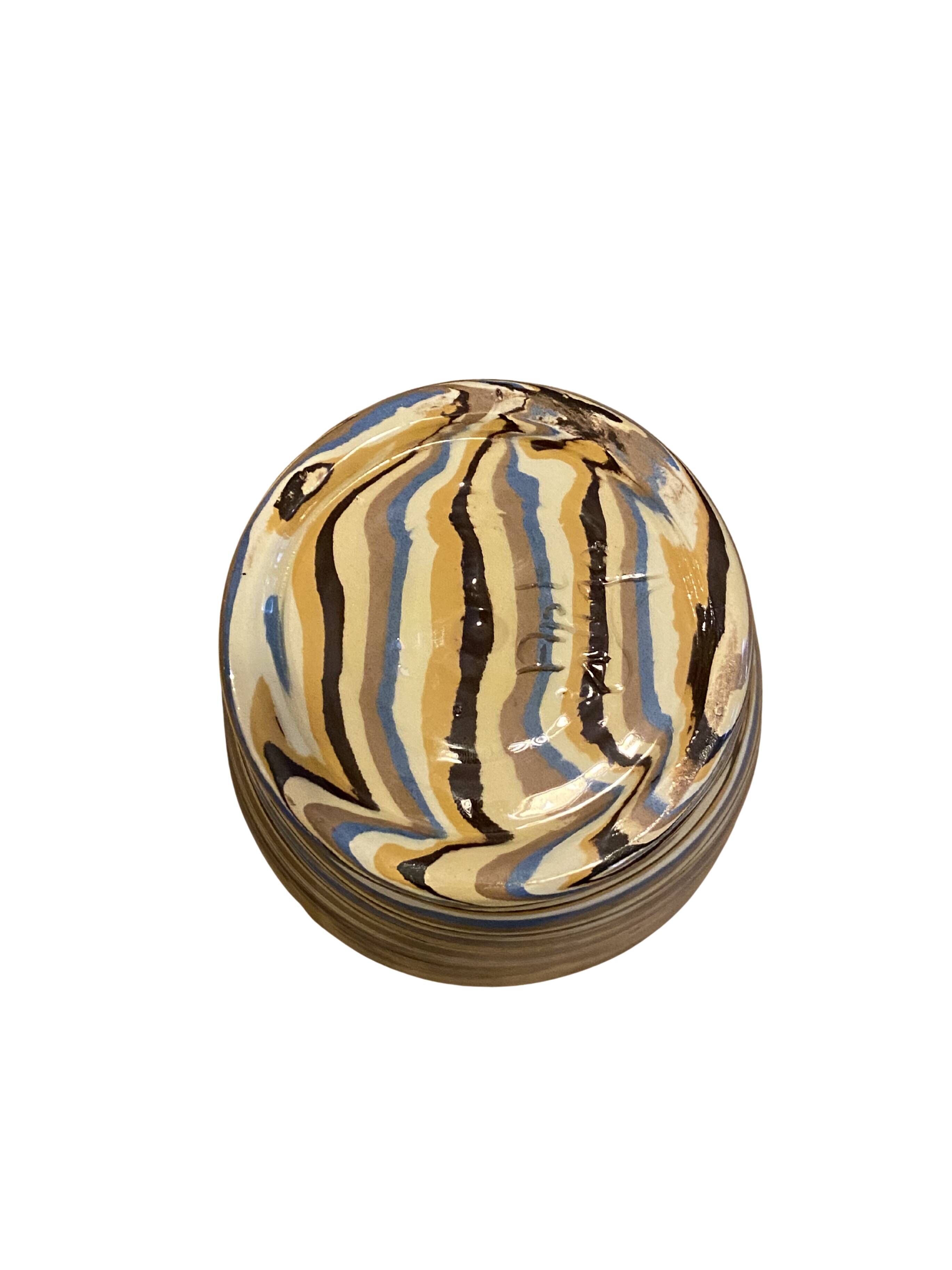 Vase en terre mêlée