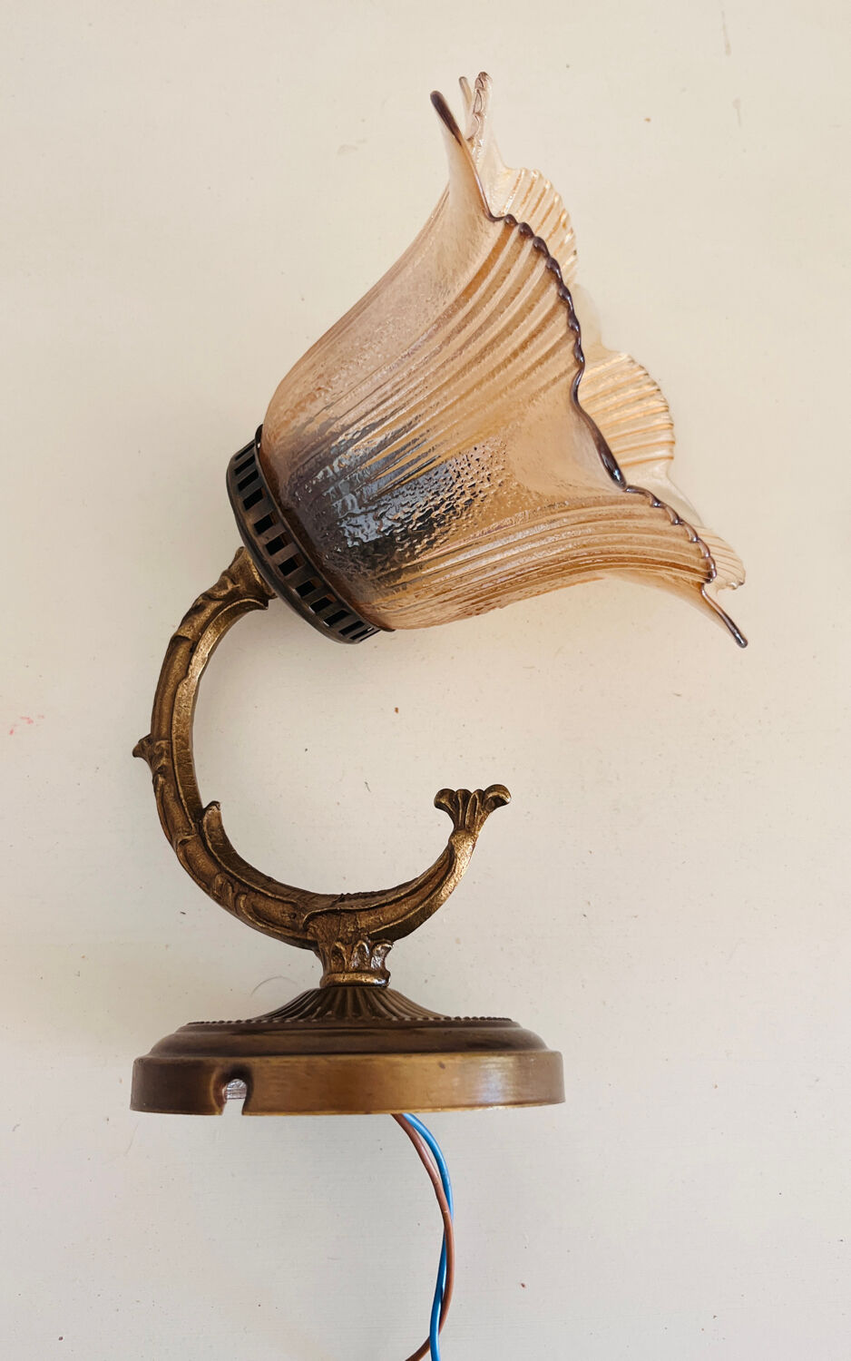 Old wall lamp with glass tulip