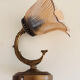 Old wall lamp with glass tulip