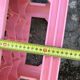 Evian bottle holder in pink plastic