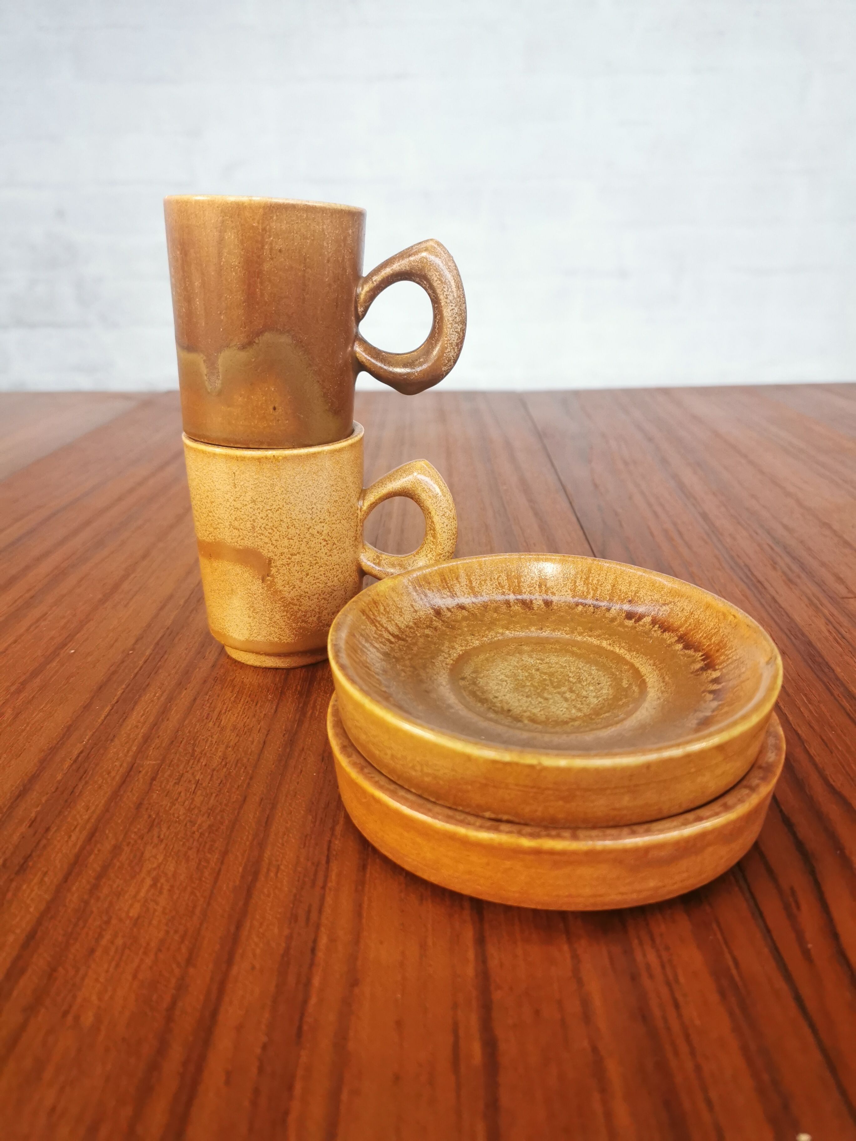 Duo of vintage stoneware cups