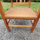 Scandinavian armchair of the 50s in cherry tree sitting in rope