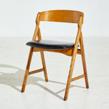 Model 71 oak dining chair by Henning Kjærnulf for Boltings