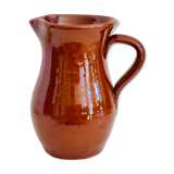 Vintage pitcher in glazed earth