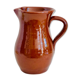 Vintage pitcher in glazed earth