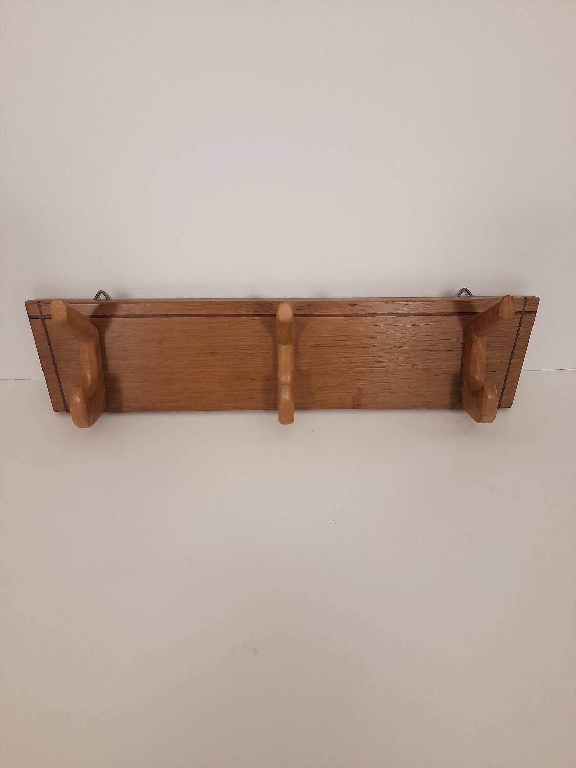 Pretty trapezoidal coat hook from the 60s