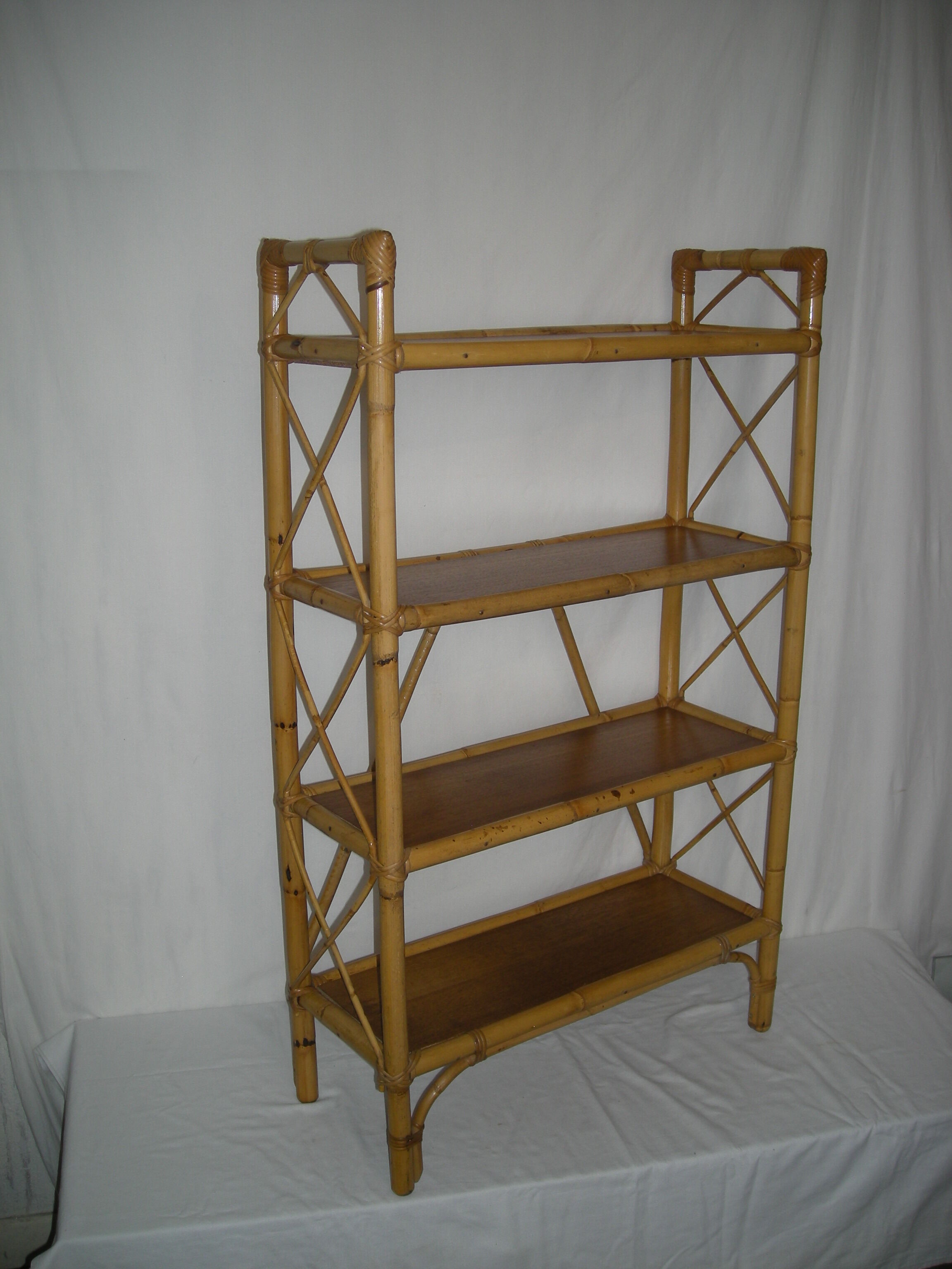 Rattan bamboo shelf on feet from the 50s 60s