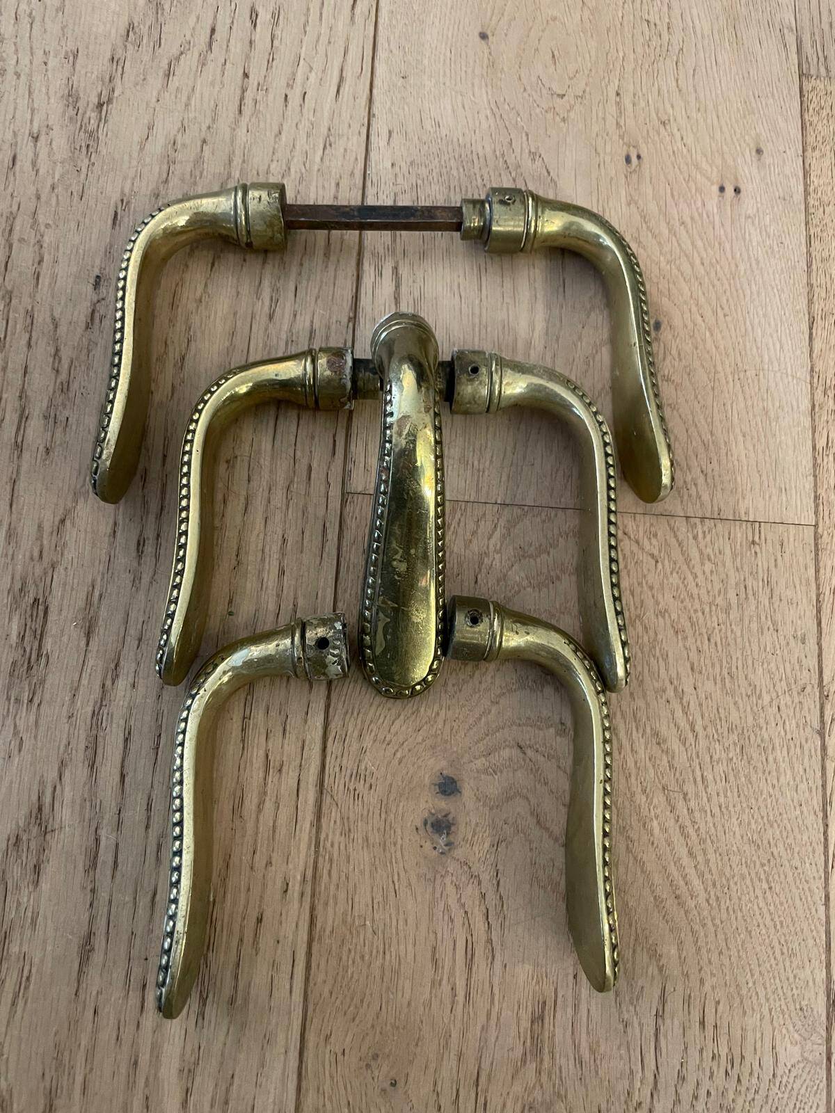 Set of 7 solid brass door handles