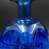 Blue glass vase and touches of white