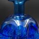 Blue glass vase and touches of white