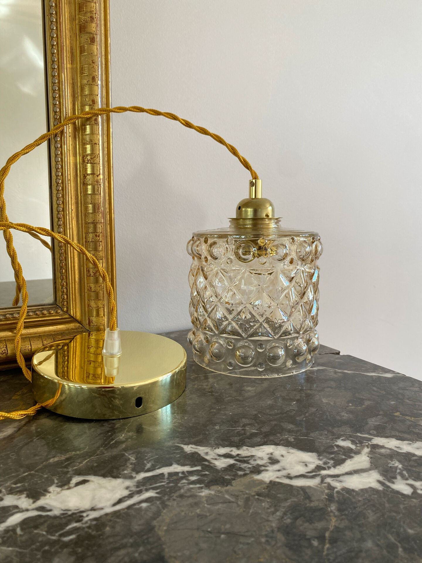 Vintage amber glass suspension globe