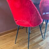 Pair of Pelfran moumoute barrel chairs, vintage from the 60s-70s, compass base.