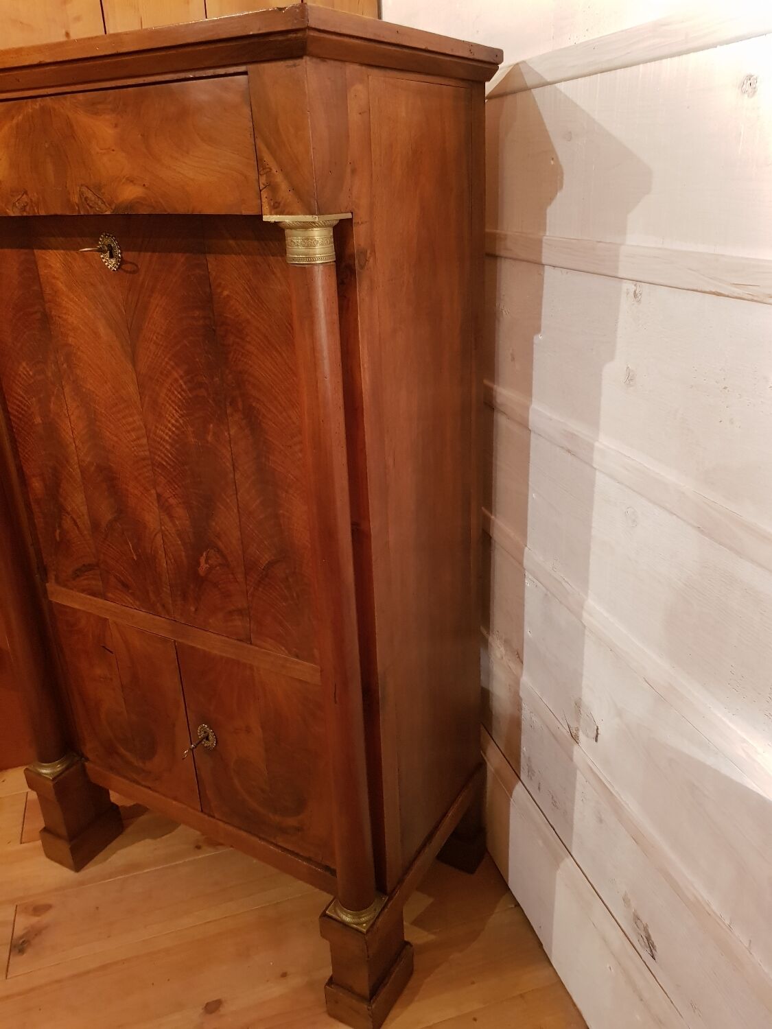 Empire secretary in walnut.