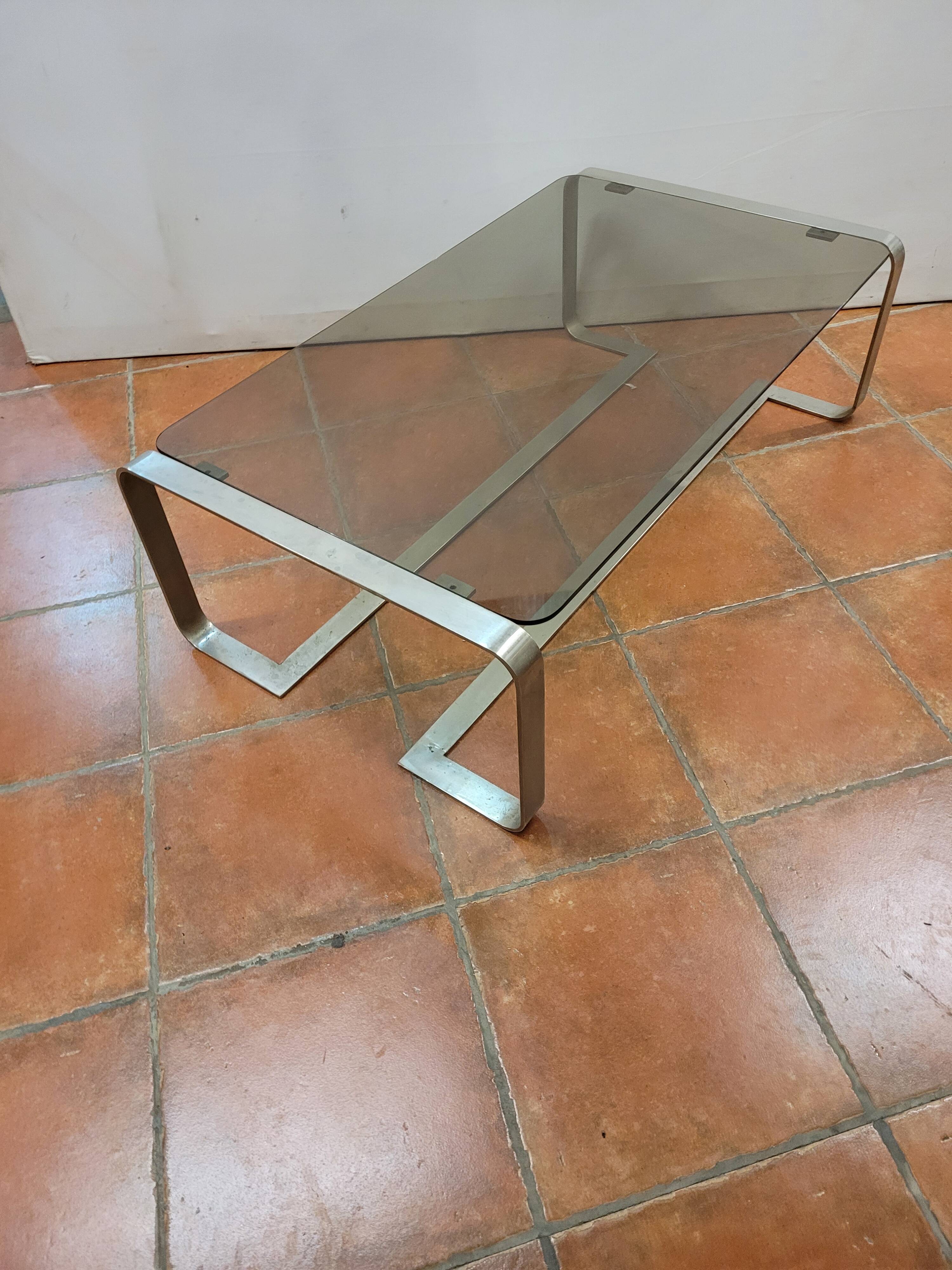 Coffee table with stainless steel base and smoked glass, from the 70s