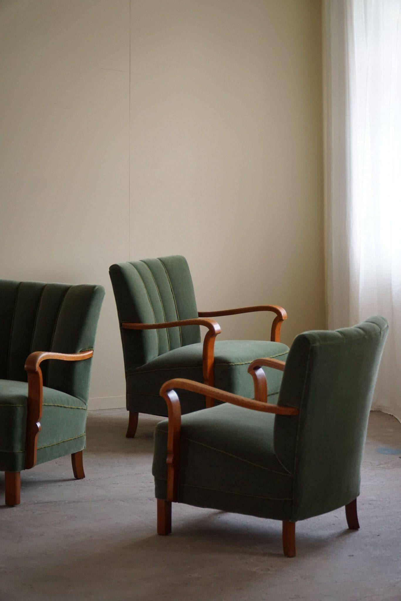 Danish Art Deco, set of 3 oak armchairs, reupholstered in green mohair, 1930s.