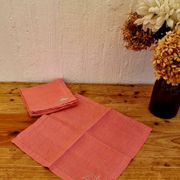 Set of 4 embroidered pink napkins.