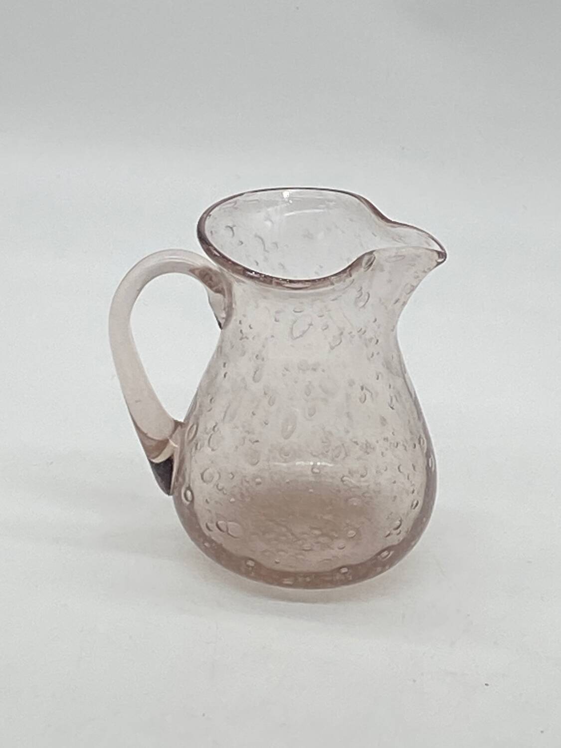 Biot style bubbled glass pitcher, pink tones, vintage