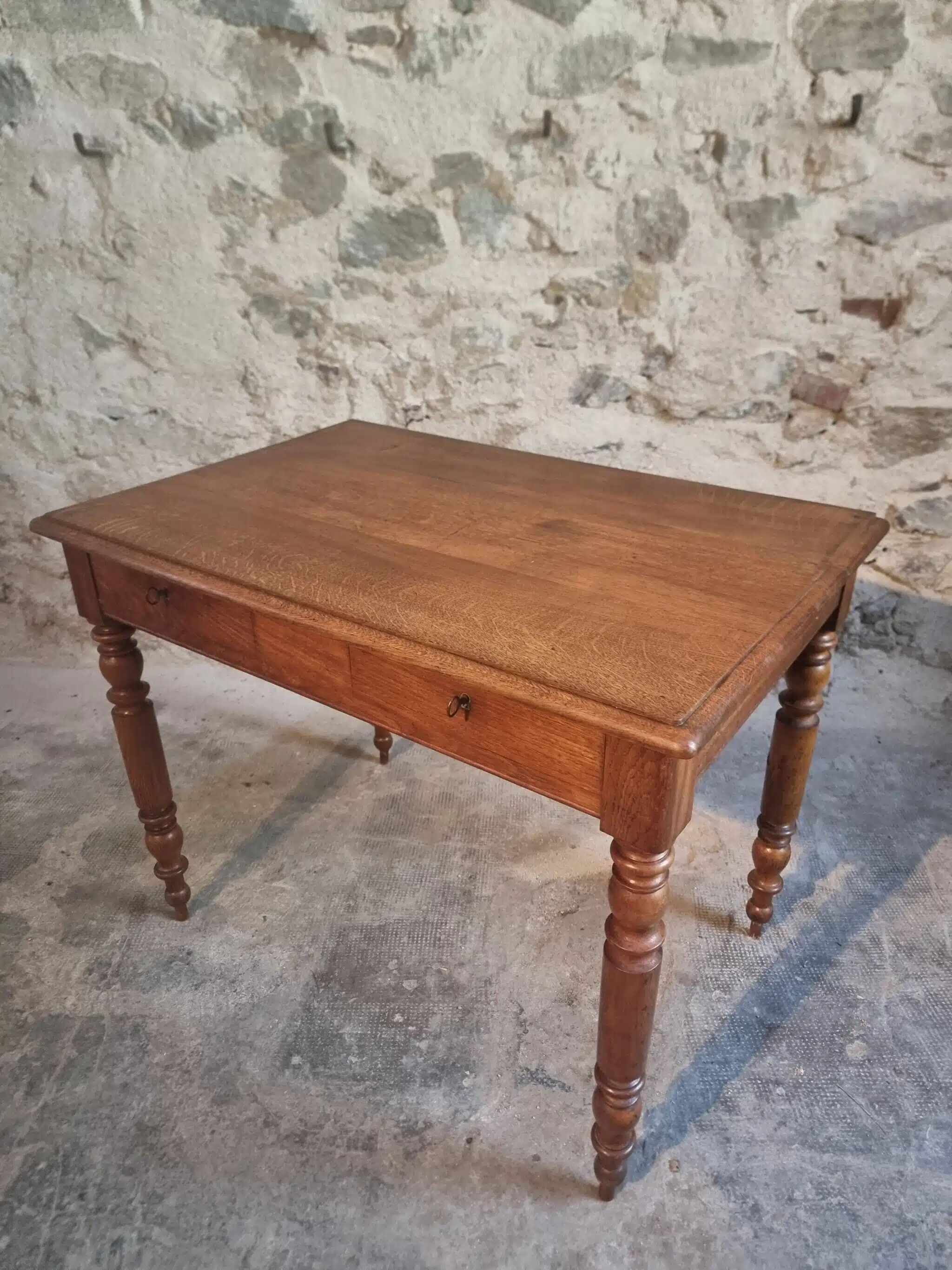 Antique French oak writing desk with 2 lockable drawers, circa 1920.