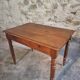Antique French oak writing desk with 2 lockable drawers, circa 1920.