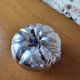 Empty silver metal pocket