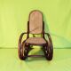 Antique curved wooden rocking chair with caning in Thonet style - Child size