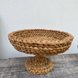 Fruit bowl on stand in woven rattan