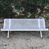 Old garden bench in perforated metal