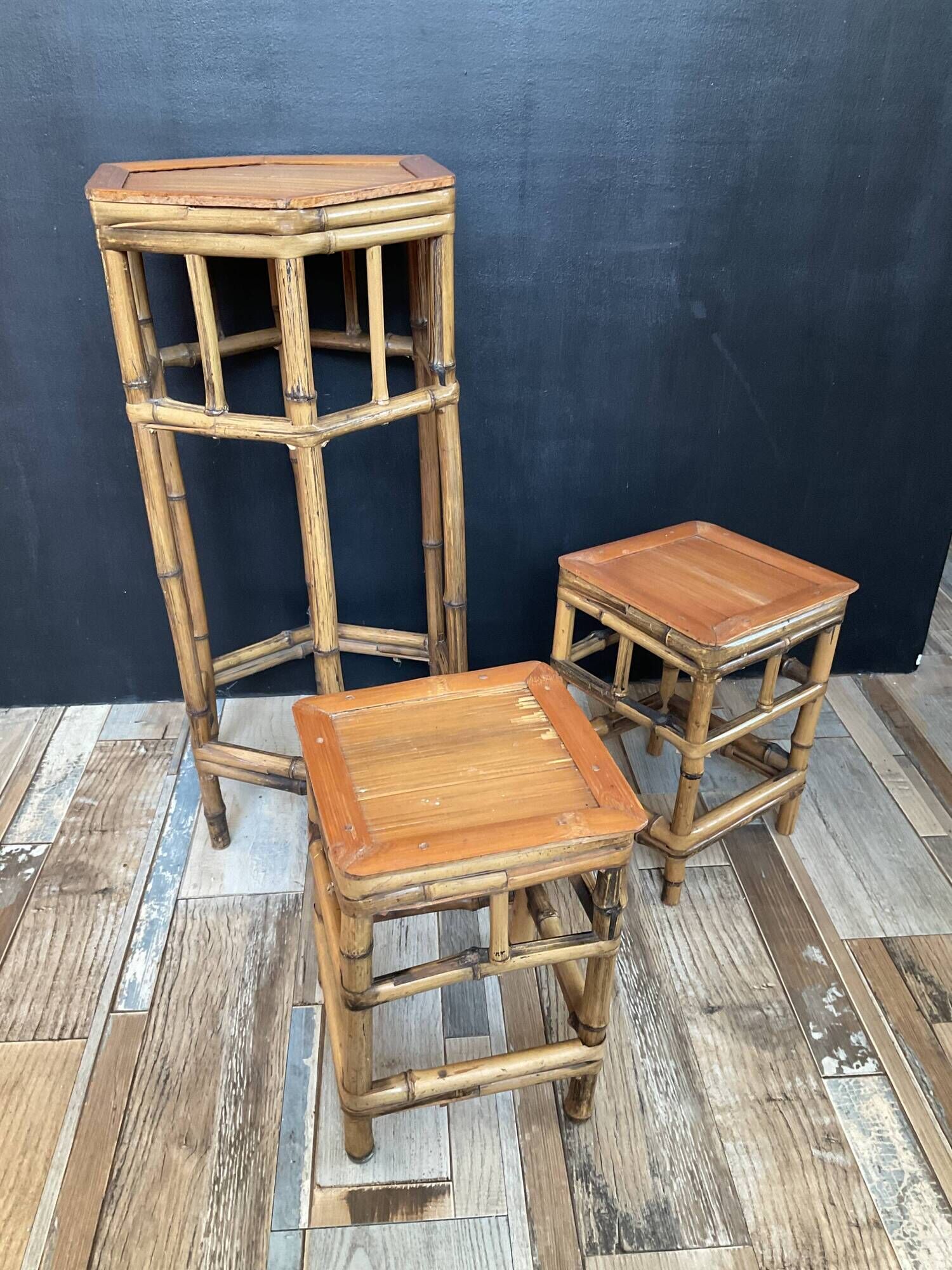 Trio of vintage rattan plant holders in the 60s