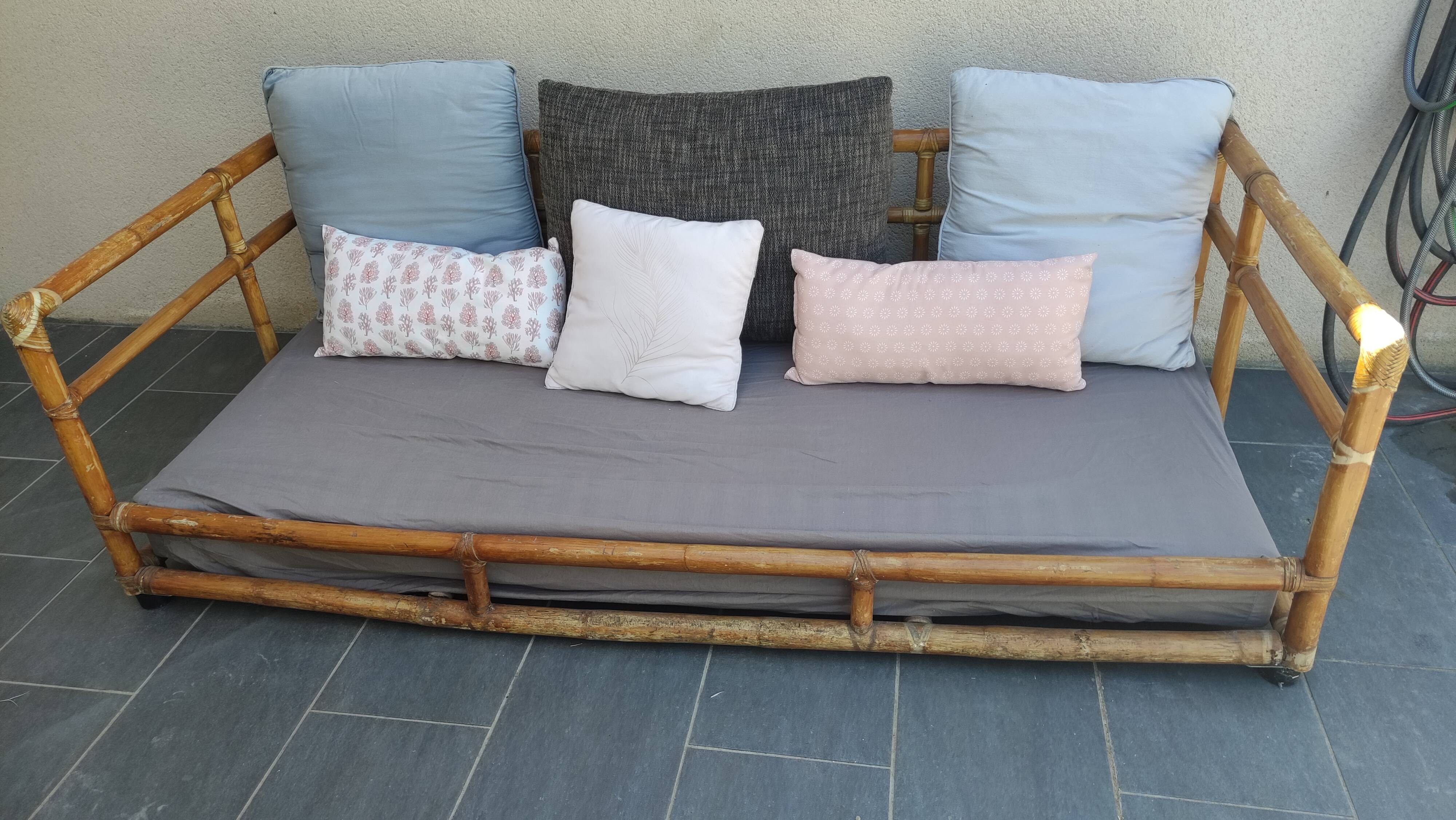 Large vintage rattan sofa bed