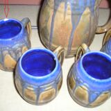 Service of 4 mugs and a carafe in flamed stoneware signed G Méténier