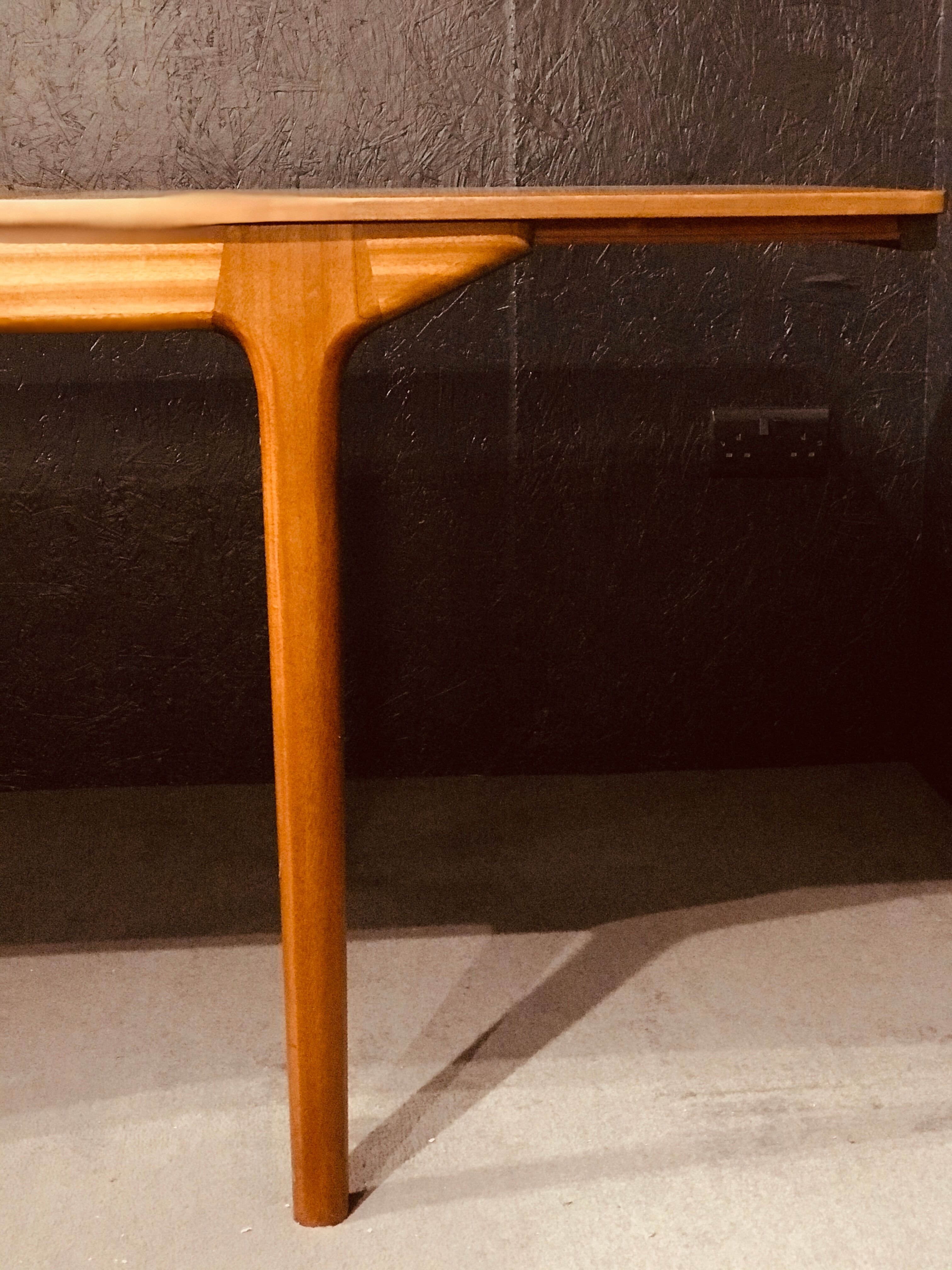 McIntosh extending table designed by Tom Robertson