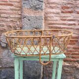 Rattan bassinet with hood arches