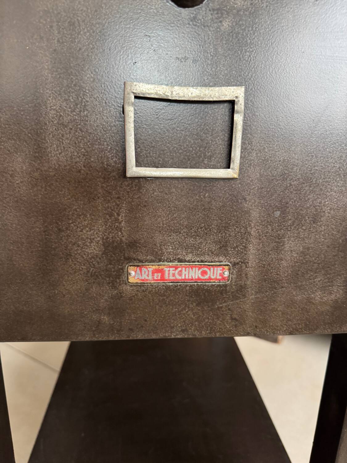 Old vintage industrial filing cabinet on wheels