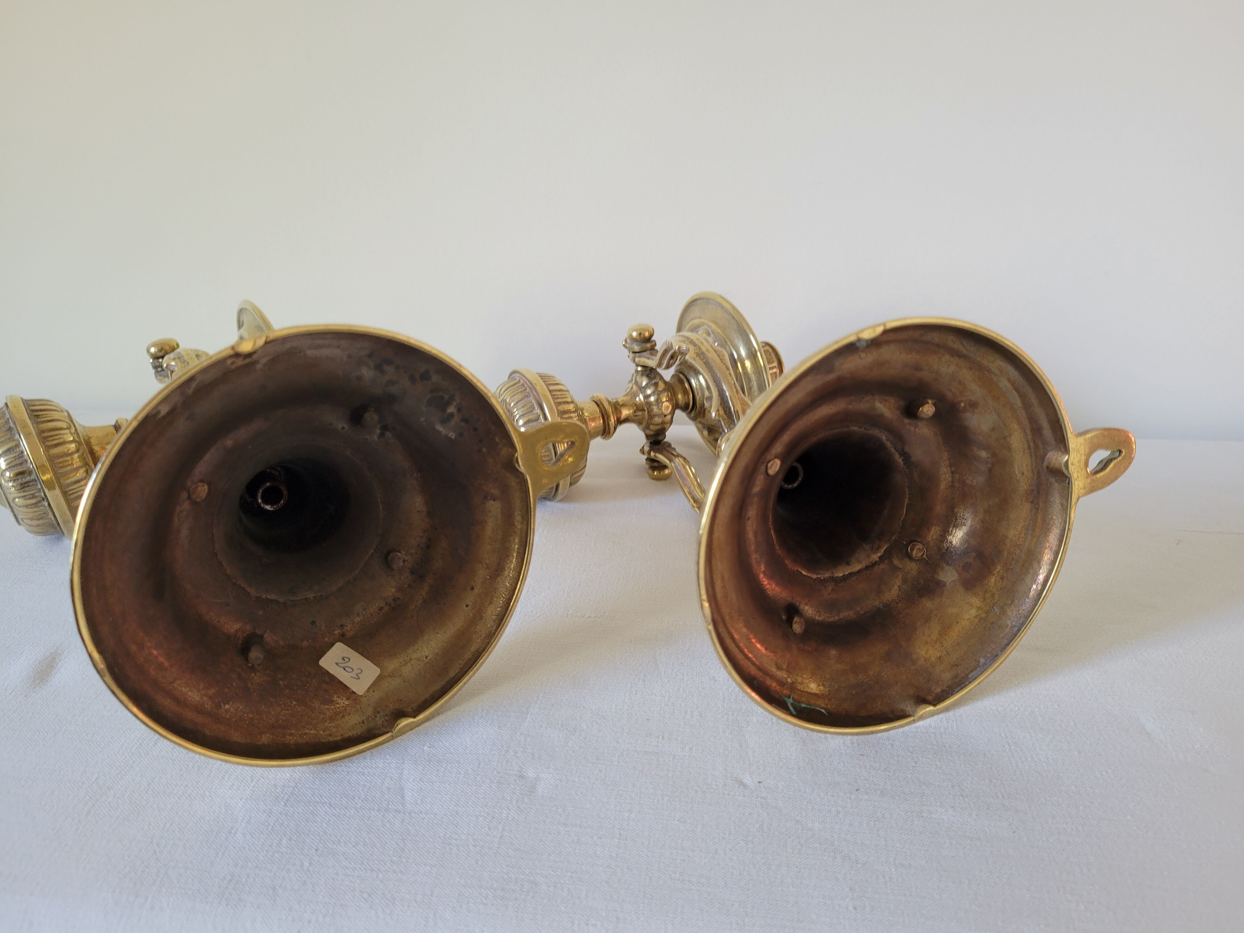 Duo of brass balance wall candle holders