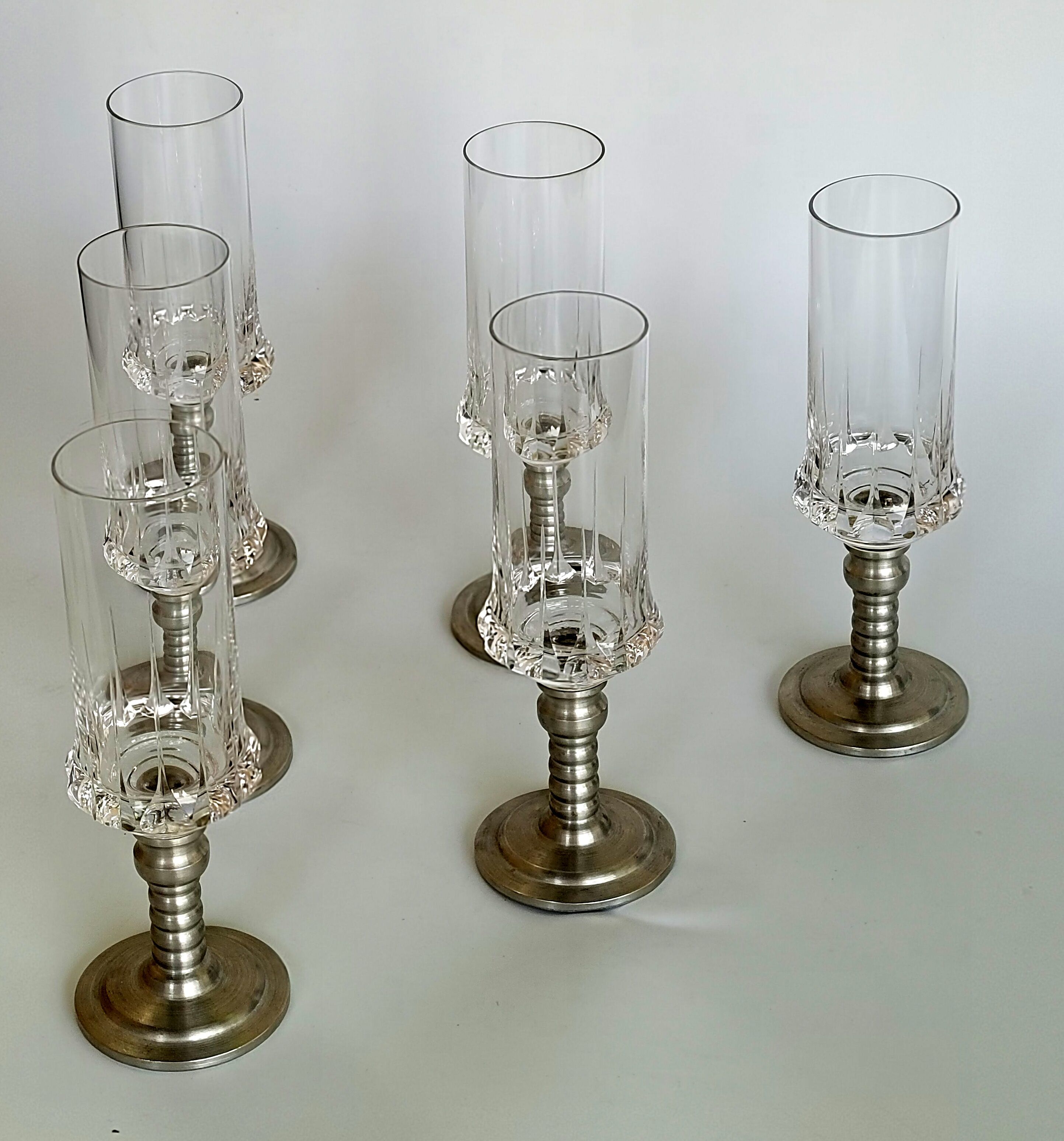 Series of six crystal champagne flute glass with tin foot