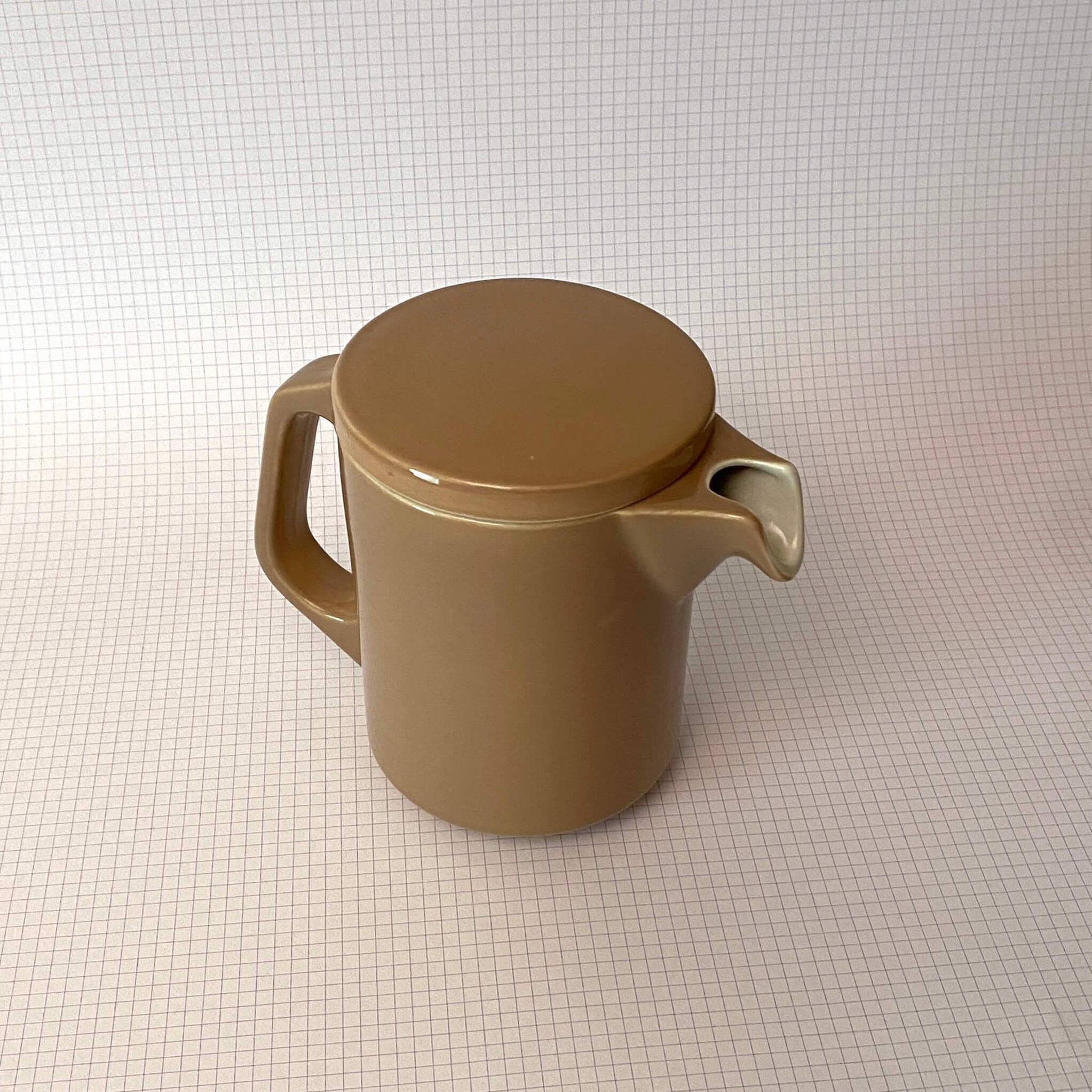 Brown ceramic pitcher