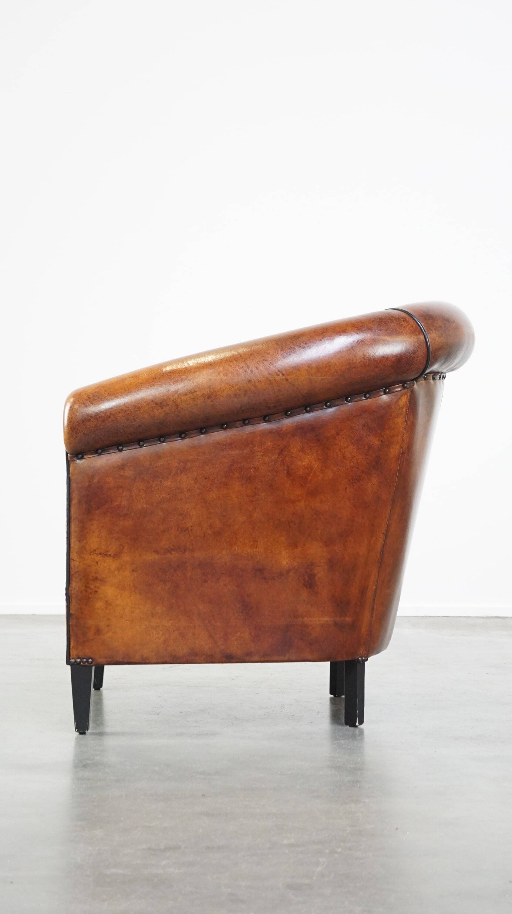Fauteuil club vintage en cuir de mouton