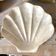 Vintage shell-shaped catchall made of Capiz mother-of-pearl.
