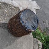 Brown woven vintage Hungarian wicker basket, reinforced edge and metal handles, 1940s.