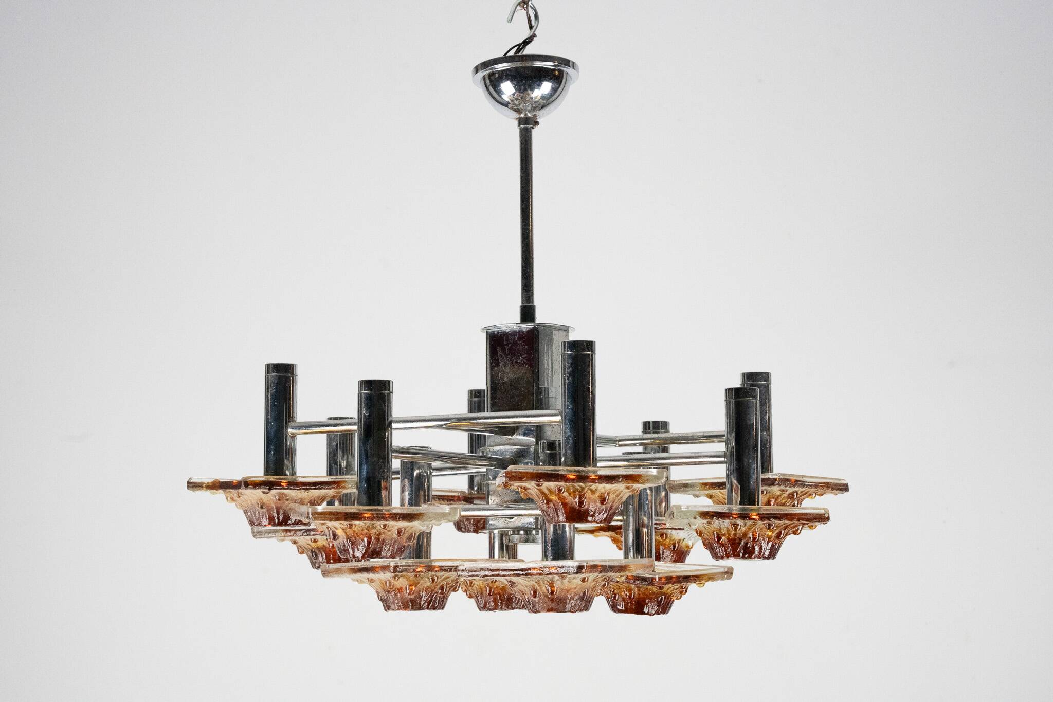 12-light Mazzega chandelier in amber and clear murano glass and chrome. Ita