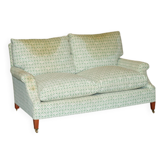 Howard & Son's Chairs Ltd ticking fabric canapé with feather cushions.