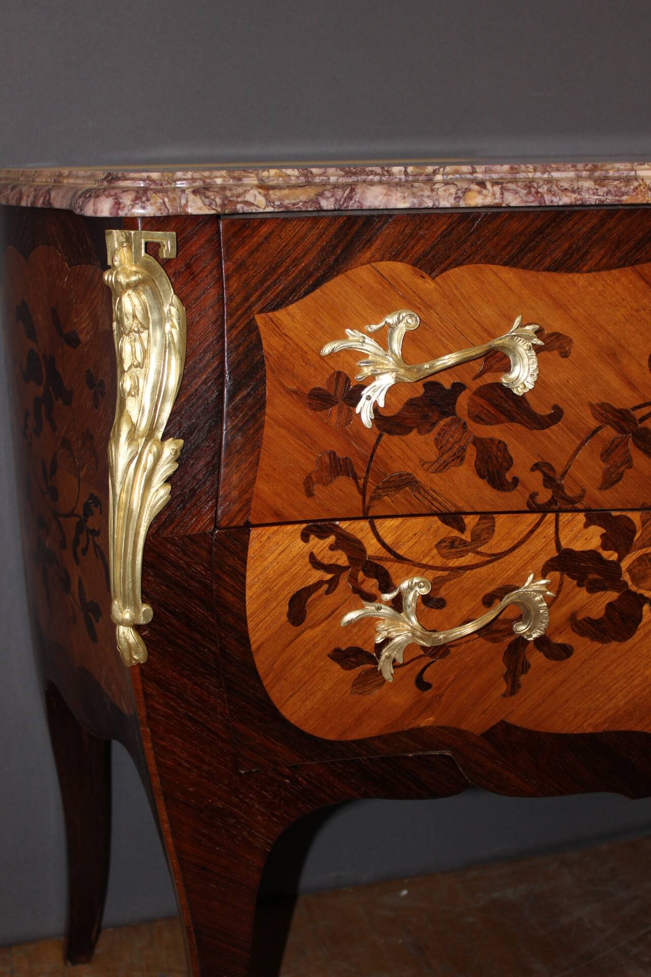 Louis XV style commode in marquetry from around 1930.