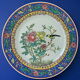 Chinese porcelain plate decorated with a trendy bird