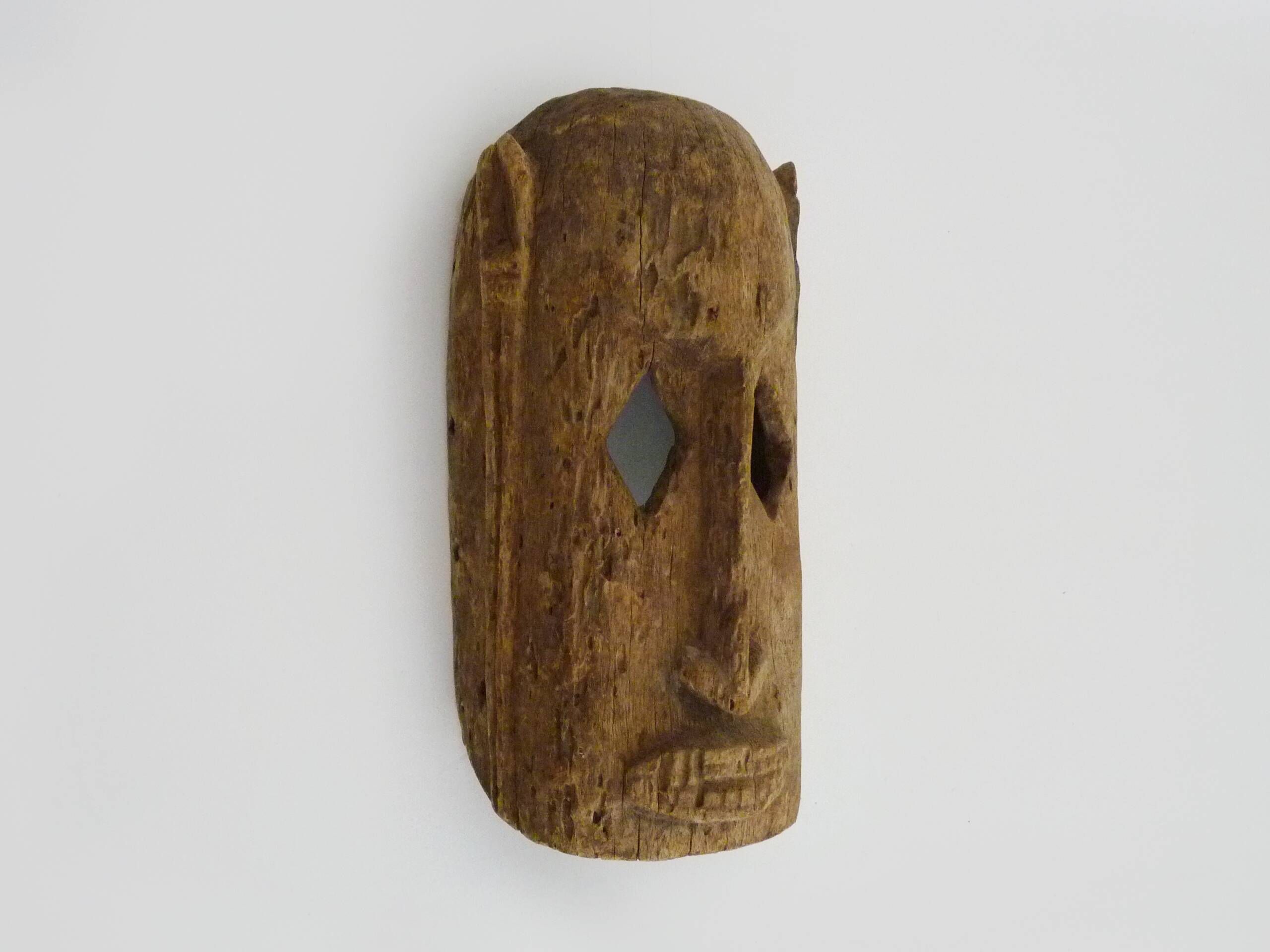 Old Dogon mask from Mali in wood. African mask from the 50s
