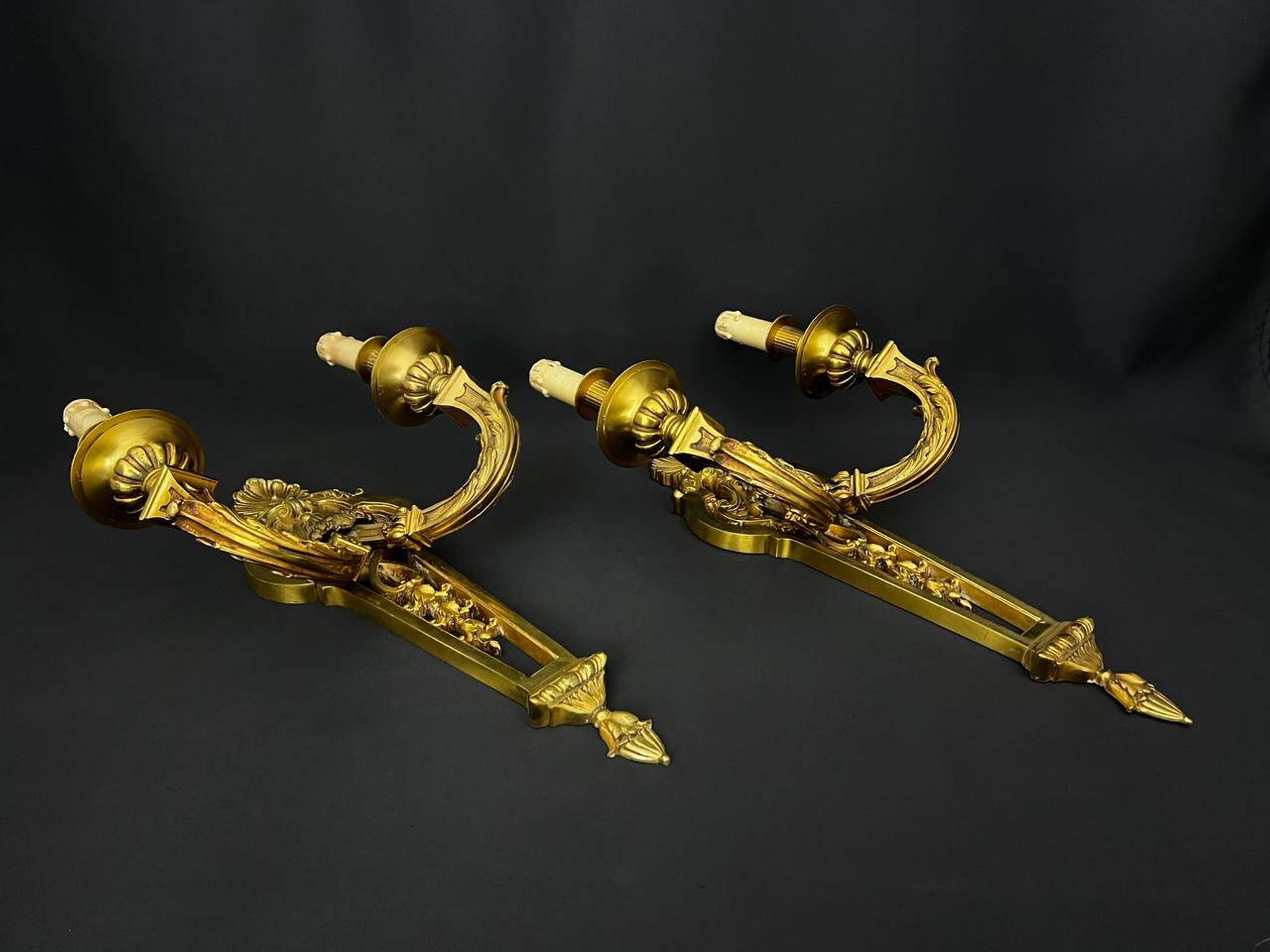 Large pair of gilt bronze wall sconces in the Louis XVI style.