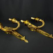 Large pair of gilt bronze wall sconces in the Louis XVI style.