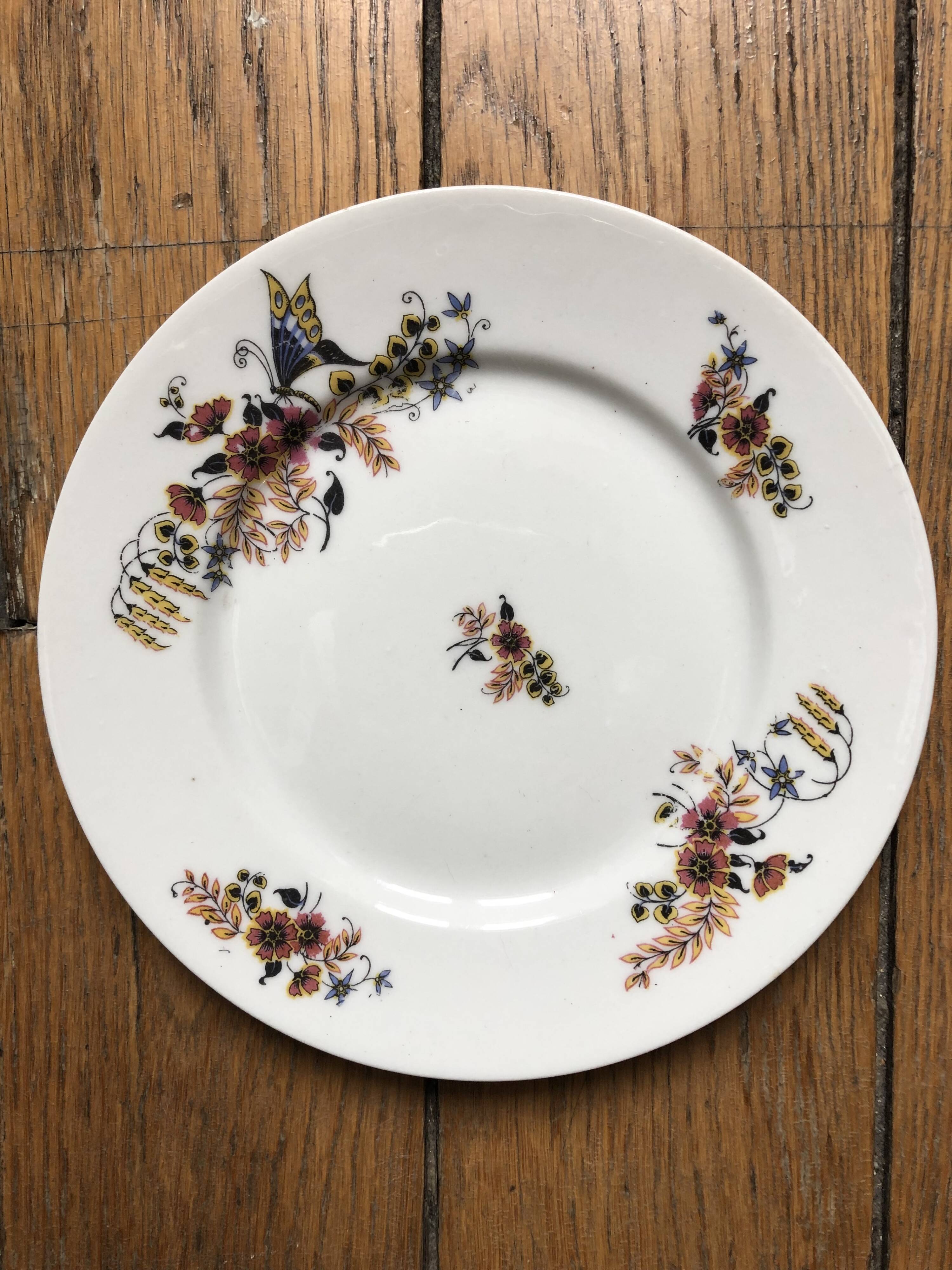 Set of 7 dessert plates in porcelain, butterfly pattern and wheat sheaves.