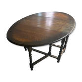 Table pliante en bois avec pieds torsadés
