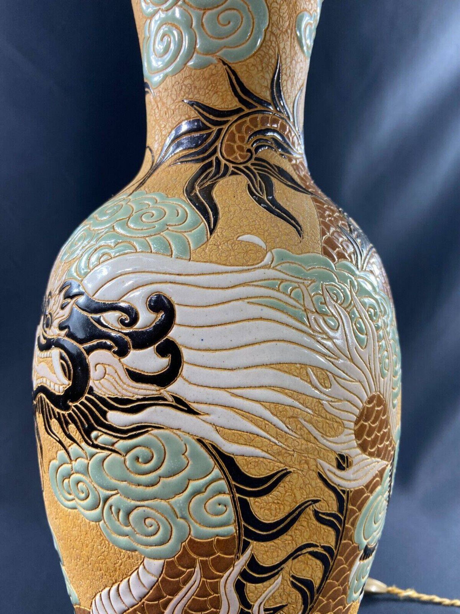 Very large dragon lamp on a yellow background in well-fired Vietnamese stoneware.