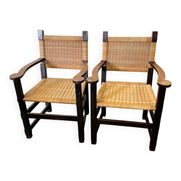 Paire de fauteuils en chêne et rotin sur mesure, France, années 1940.